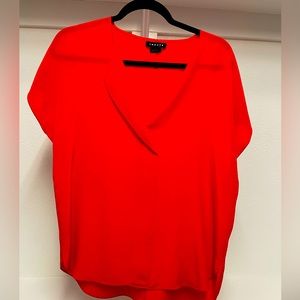 Trouvé red silk top in medium. Great capsule piece